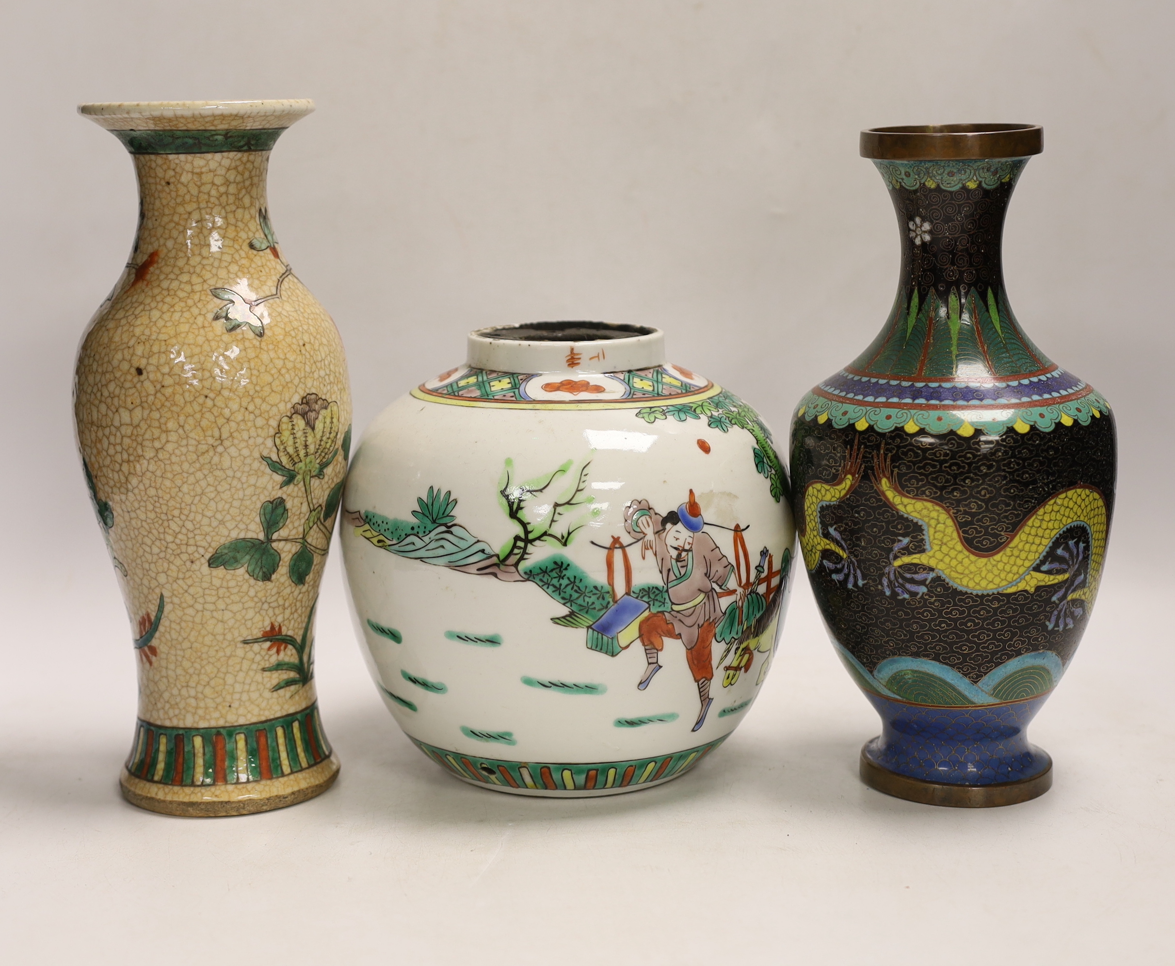 A Chinese famille verte crackle glaze vase, a jar, a cloisonné enamel dragon vase, another enamelled jar and cover and a soapstone vase, largest 25cm high